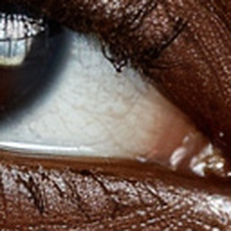 The lower-right sclera from a 128 pixel source region stretched to 808 pixels with Lanczos resizing